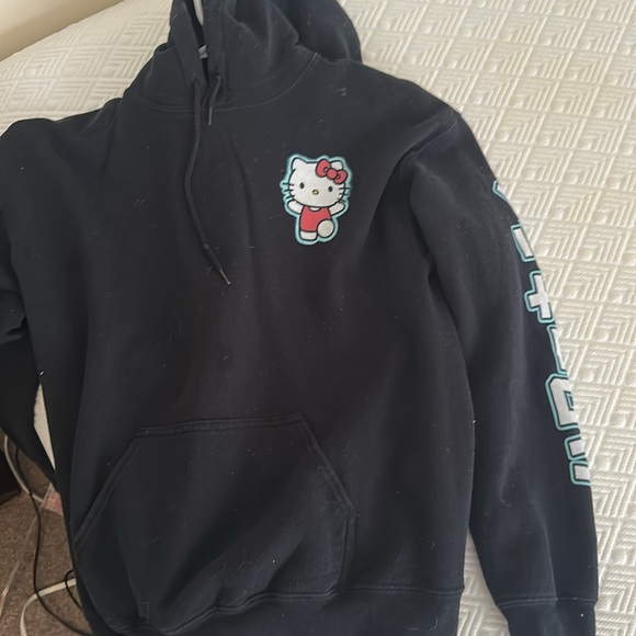 Spreadshirt Aufkleber Hello Kitty Lächelnd Mit Schriftzug Sticker Aufkleber